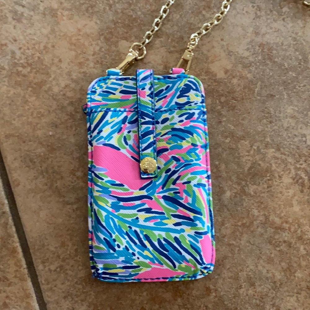 Lilly Pulitzer wallet with phone compartment.